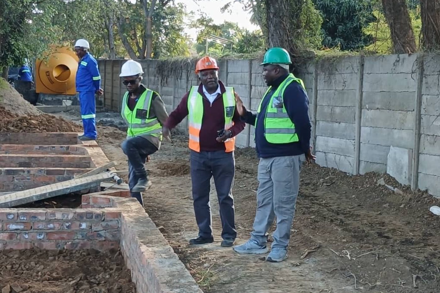 Talent Nyarungwe in conversation with the site manager