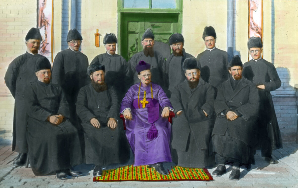 Eugen Imhof (centre) with some of the SMB missionaries in China. Front row (from left): Matthäus Ruf, Gustav Schnetzler, Eugen Imhof, Franz Fröhling, Alois Schildknecht; back row: Joachim Kaufmann, Friedrich Bossert, Gottlieb Raimann, Andreas Huser, Anton Jörg, Oskar Jäger, August Widmer. (ca. 1930, coloured, SMB archive, FDC 118/4) Eugen Imhof (centre) with some of the SMB missionaries in China. Front row (from left): Matthäus Ruf, Gustav Schnetzler, Eugen Imhof, Franz Fröhling, Alois Schildknecht; back row: Joachim Kaufmann, Friedrich Bossert, Gottlieb Raimann, Andreas Huser, Anton Jörg, Oskar Jäger, August Widmer. (ca. 1930, coloured, SMB archive, FDC 118/4)